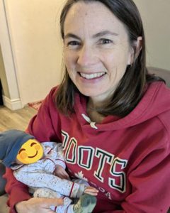 Jenn with Syeda's infant son